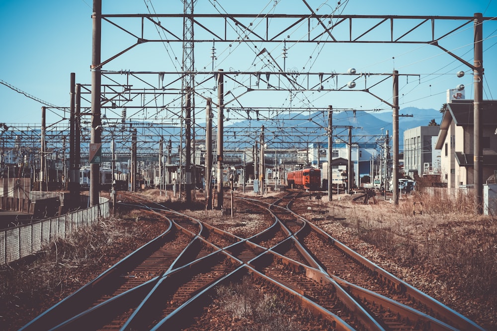 a train track running through a rural area