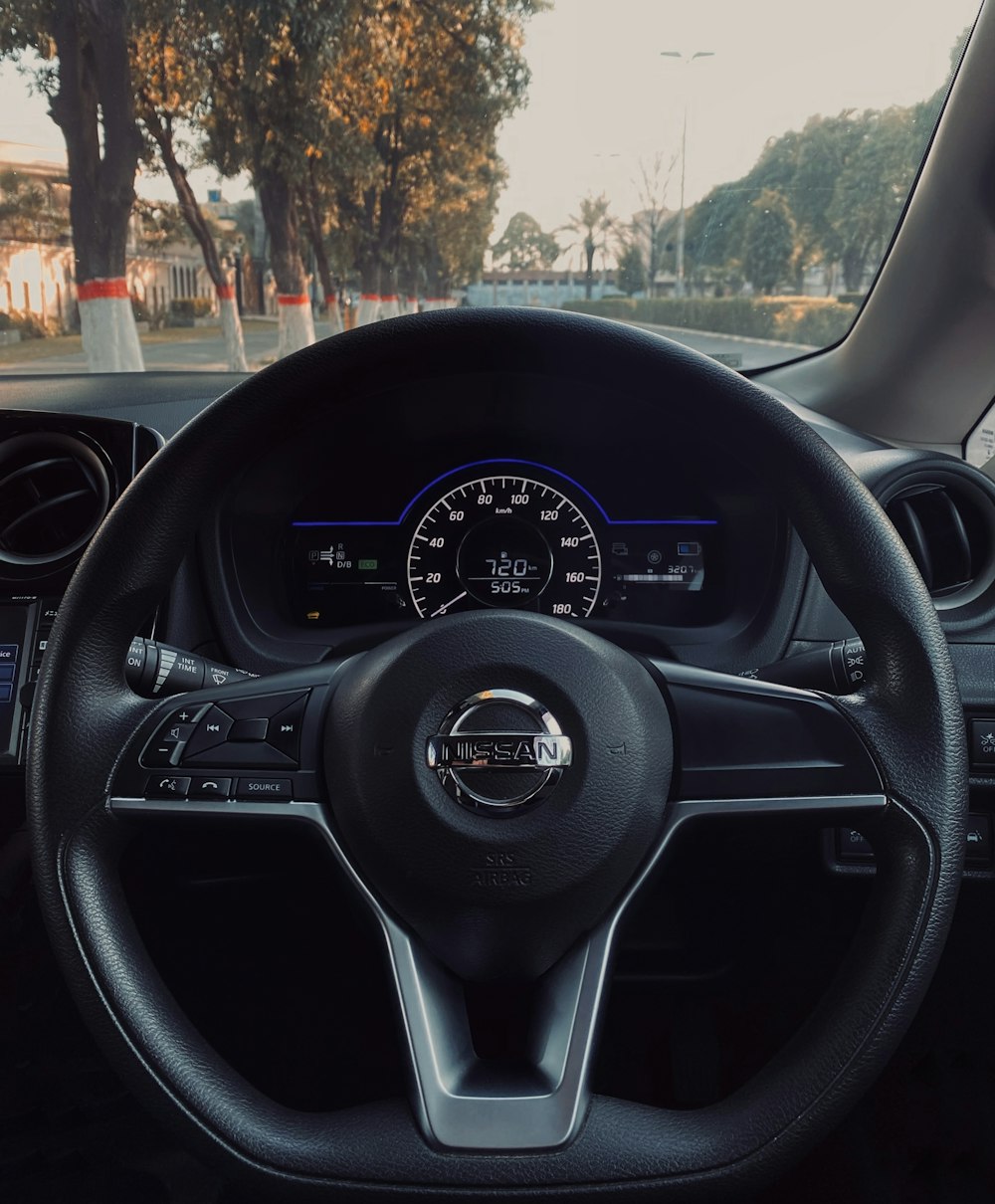 the dashboard of a car with a speedometer