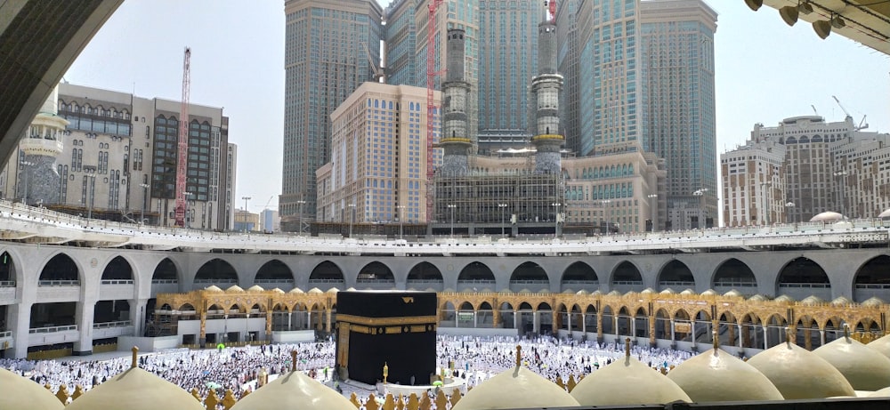 a view of the inside of a mosque in the middle of a city