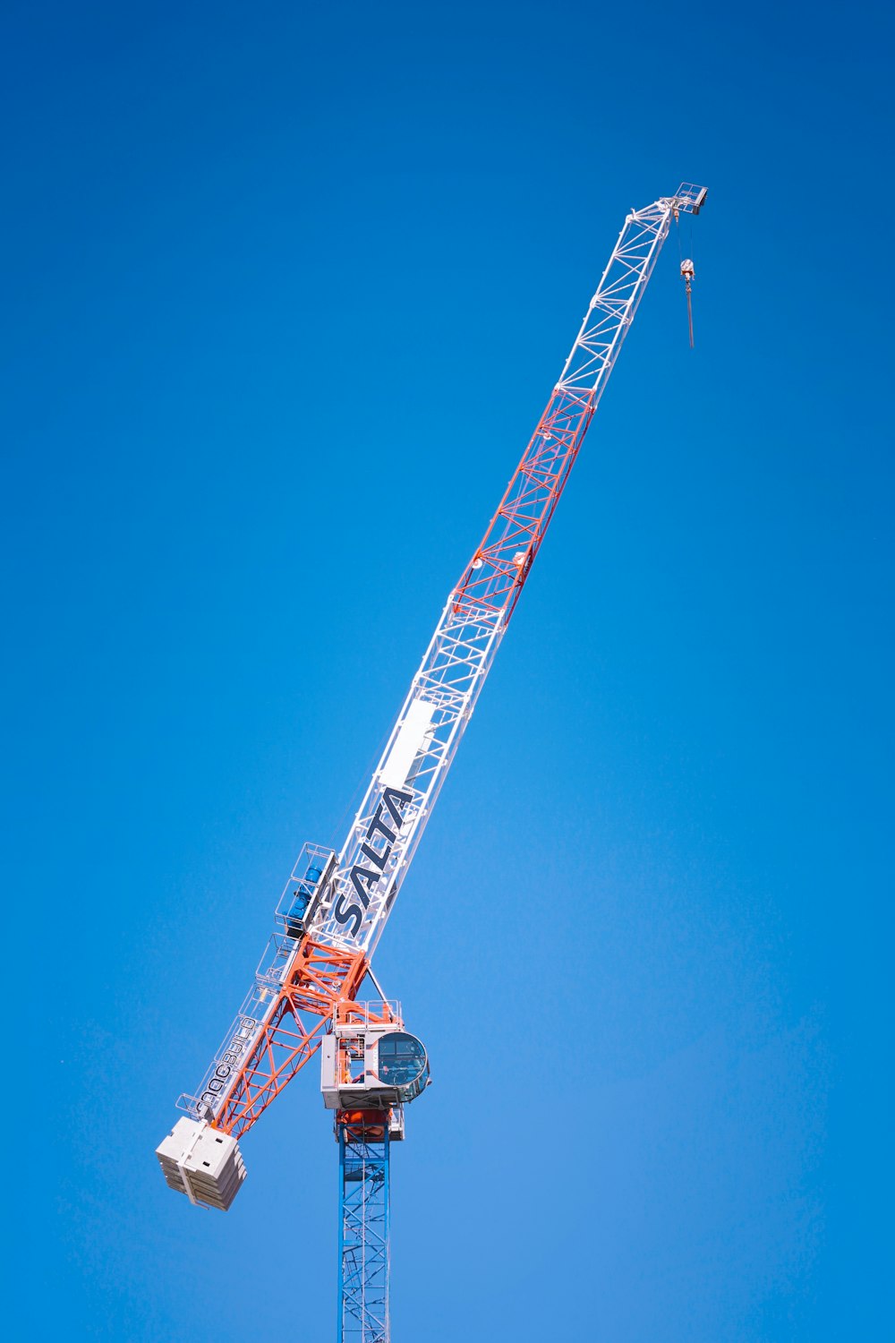 a crane that is on top of a building