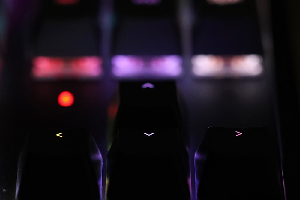 a close up of a computer keyboard with a blurry background