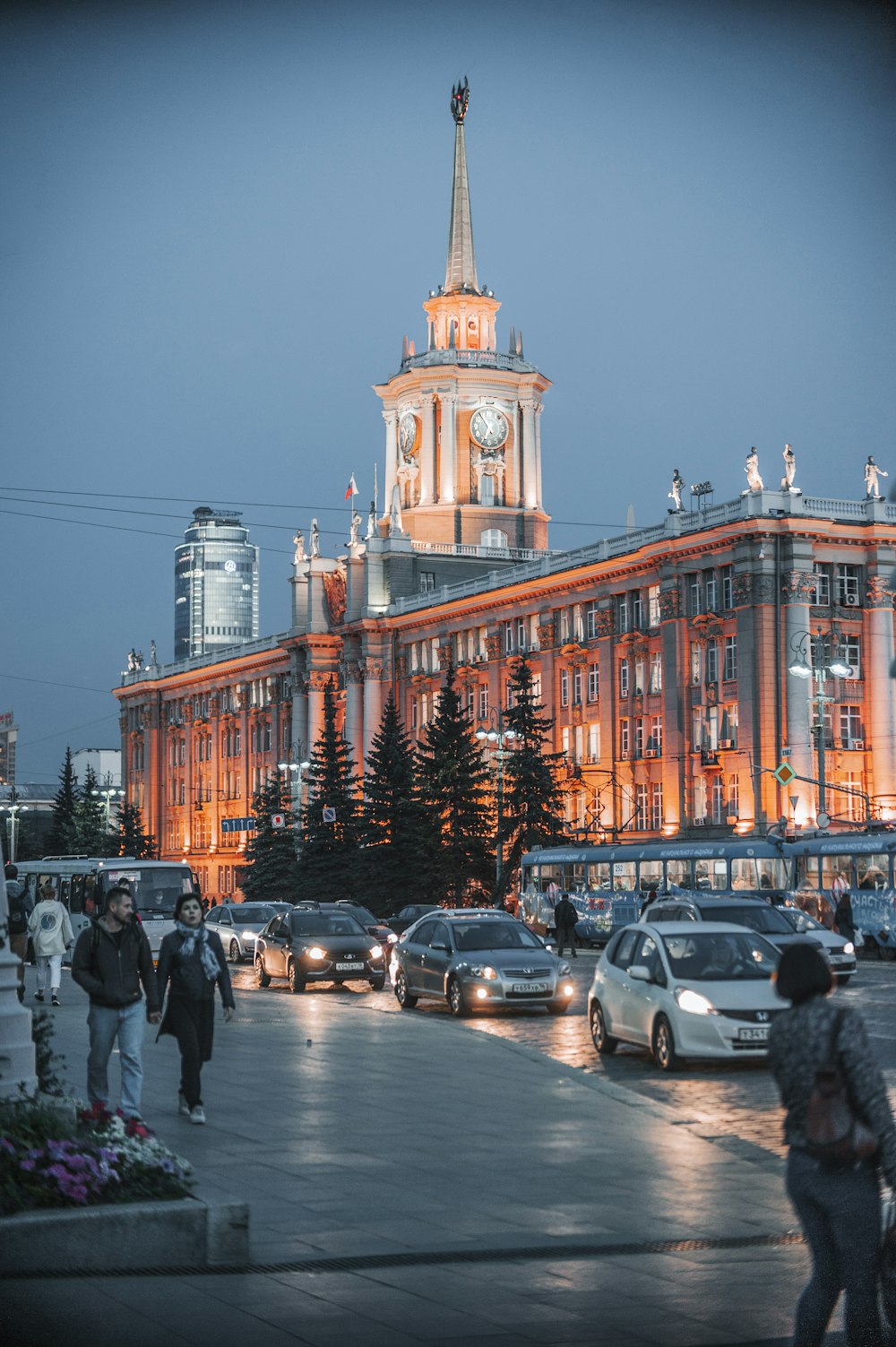 a large building with a clock tower at night