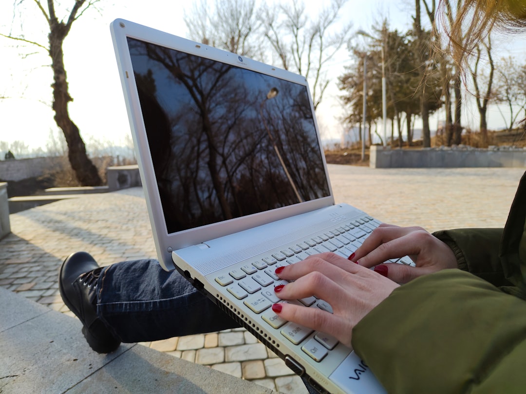 Typing on a laptop
