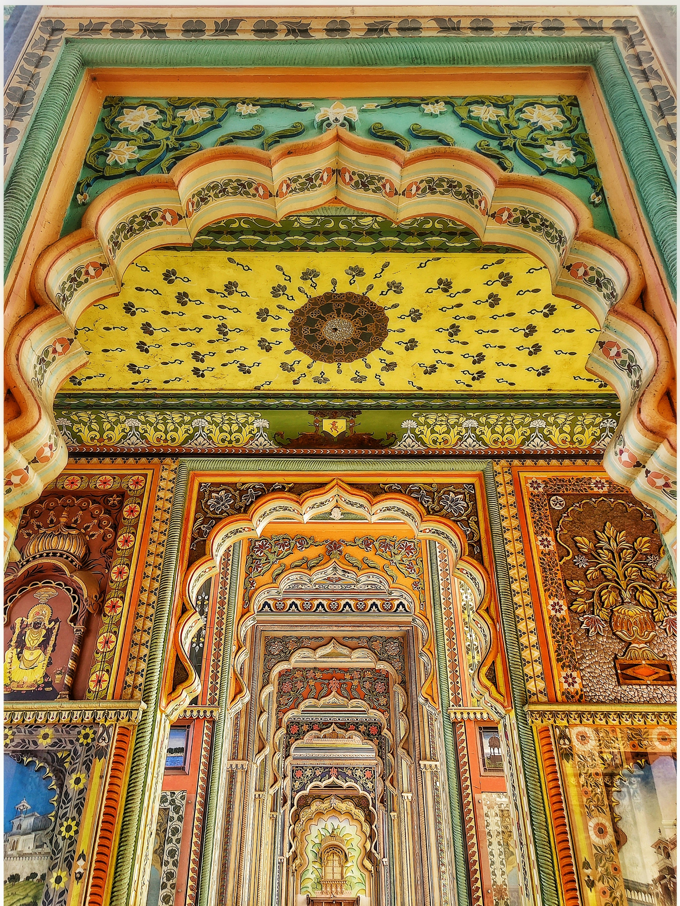 a colorful building with intricately painted walls and ceilings
