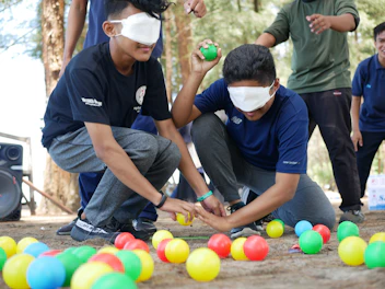 a group of young men playing with balls