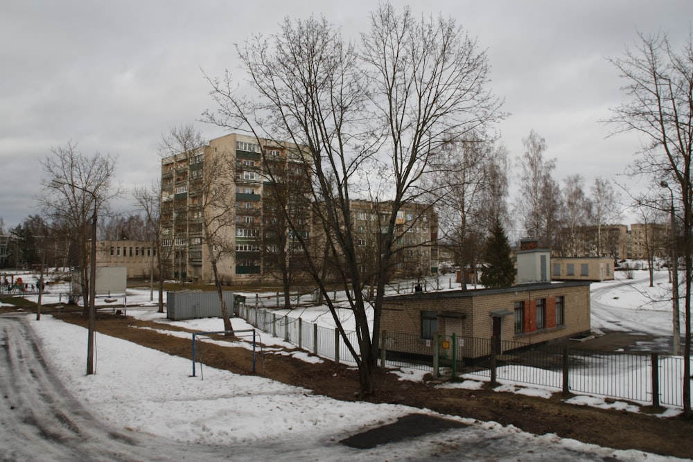 a building with a lot of snow on the ground