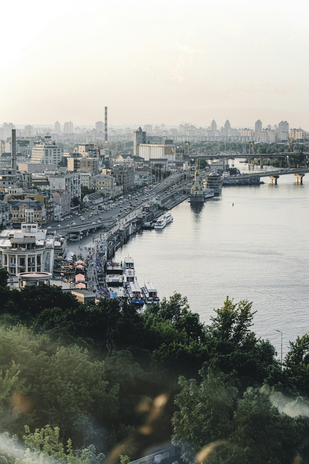 a large body of water with a city in the background