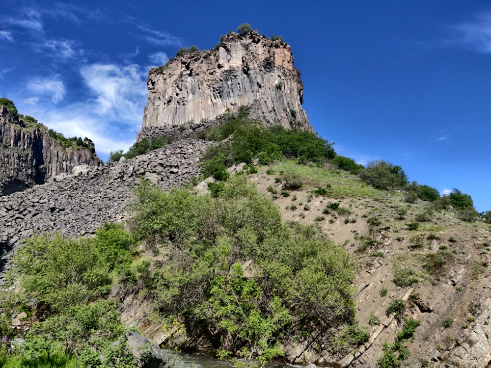 a mountain with a river running through it