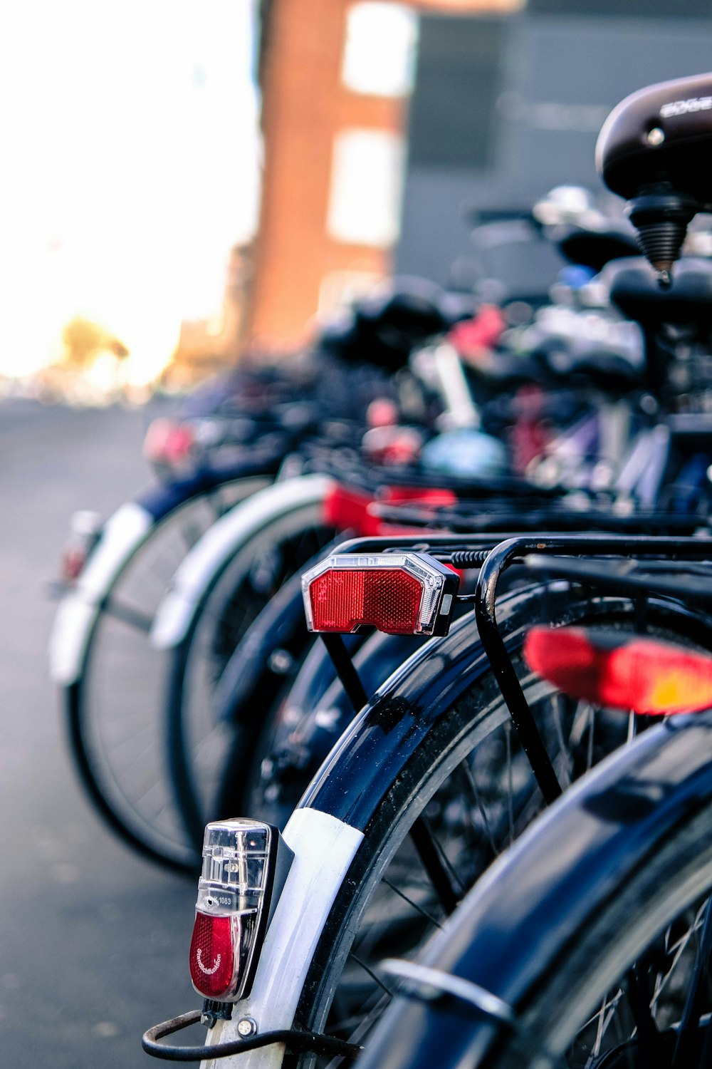 a row of bicycles parked next to each other