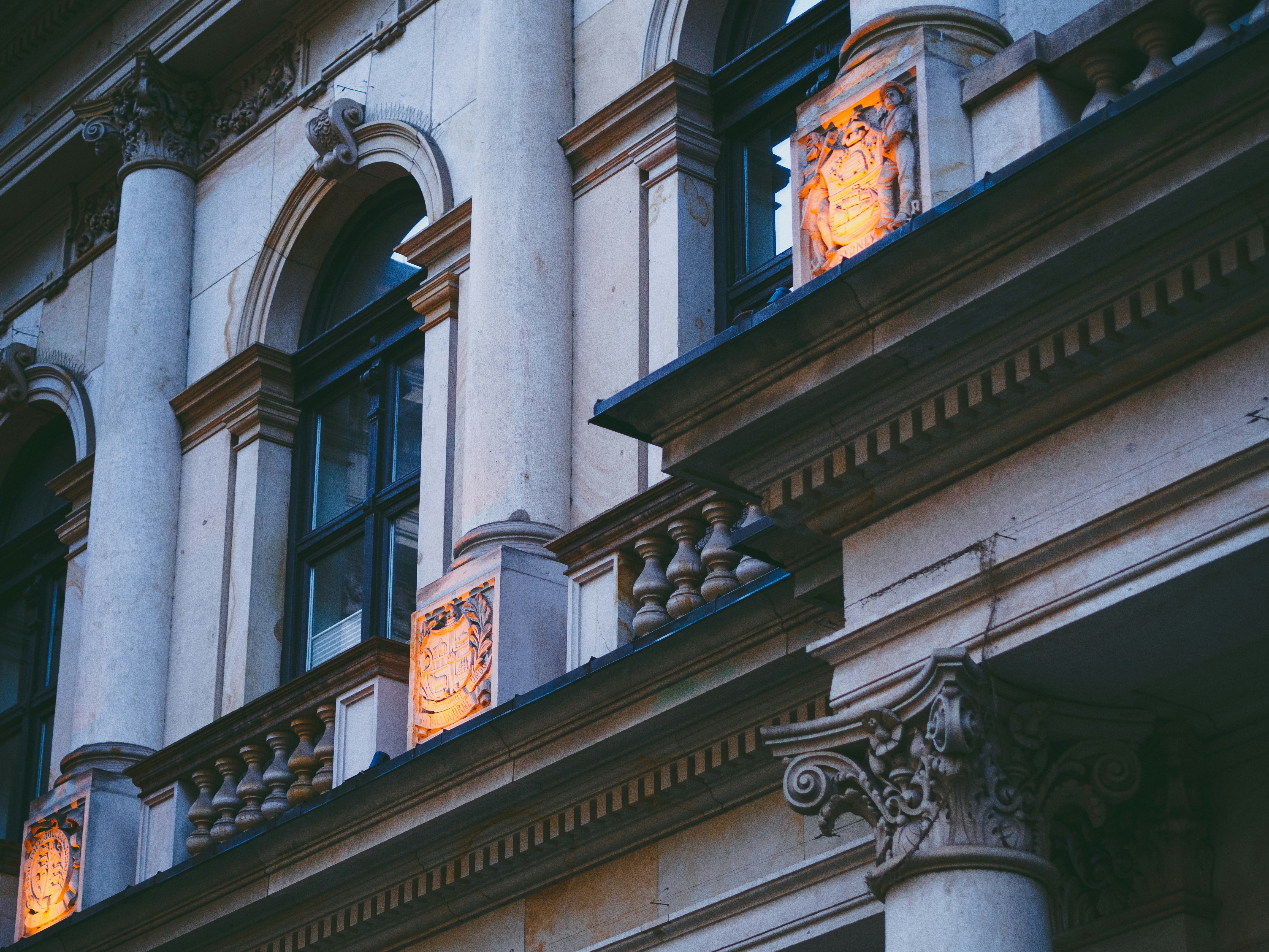 a tall building with a clock on the front of it