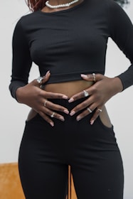 a woman with her hands on her hips