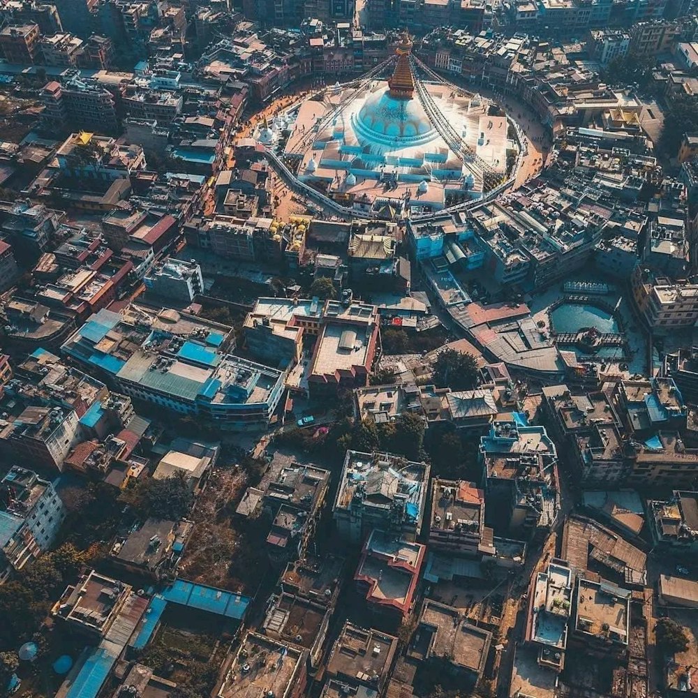 an aerial view of a city with lots of buildings