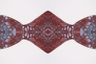 Abstract red patterns inspired by medical technology, creating a dynamic visual effect