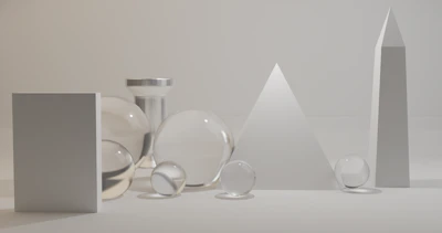 Artistic arrangement of 3D printed objects in black and warm beige tones, casting delicate shadows on a clean white table.