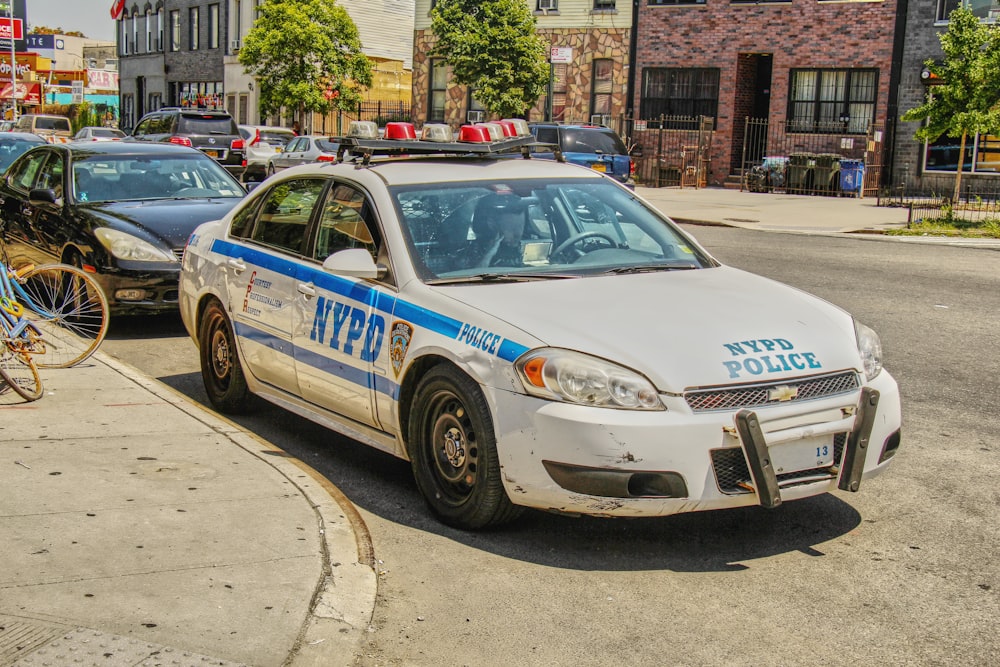 a police car parked on the side of the road