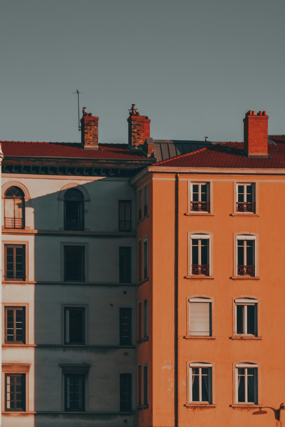 a tall building with a clock on the top of it