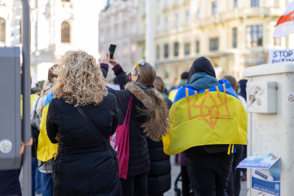 a group of people standing next to each other