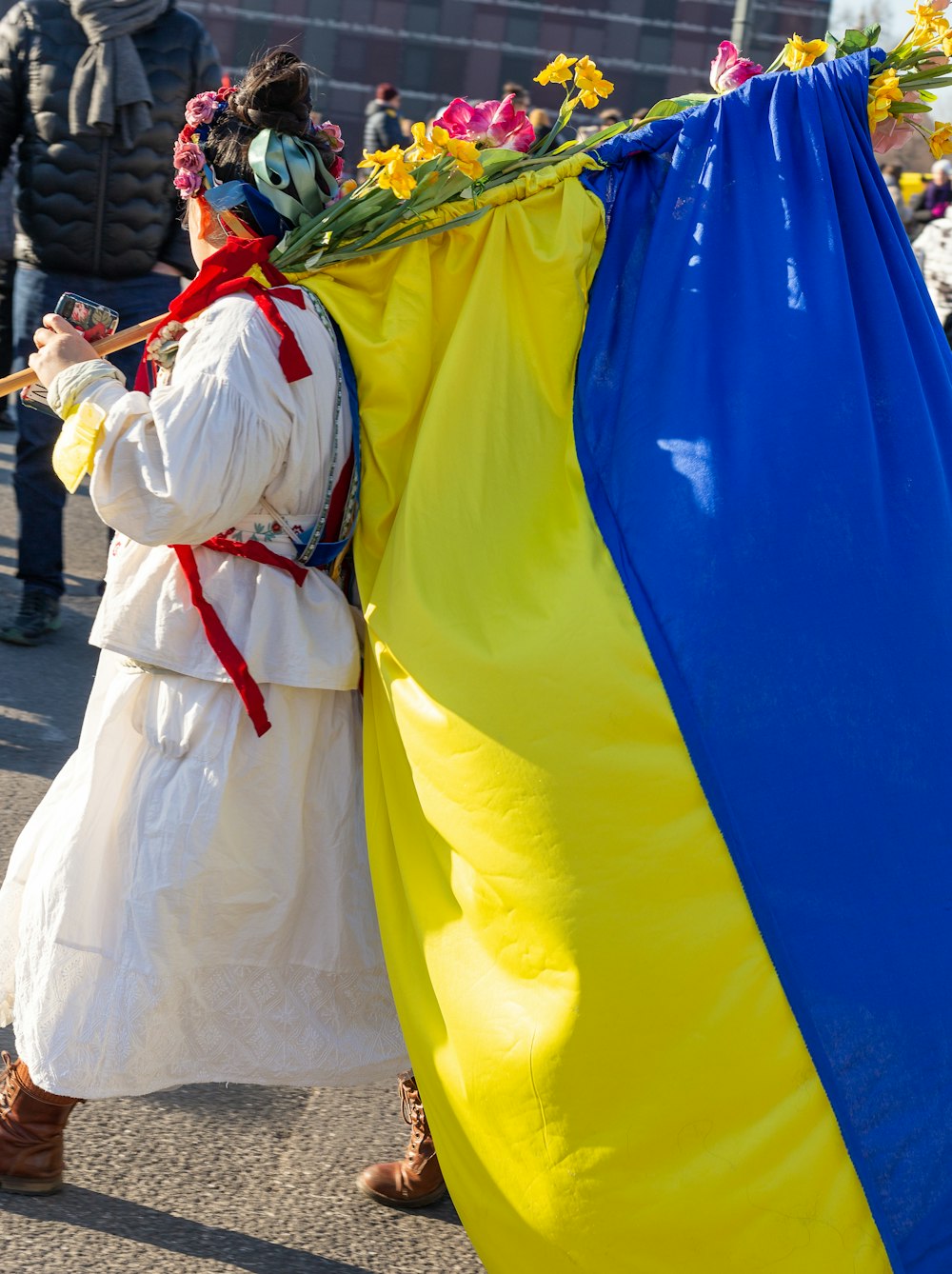 a person in a costume walking down a street