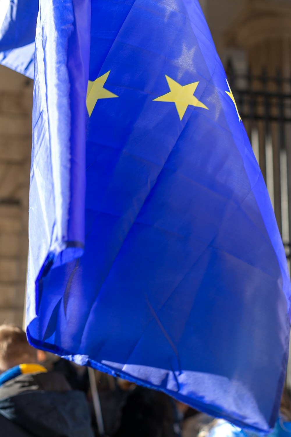 a blue flag with yellow stars on it