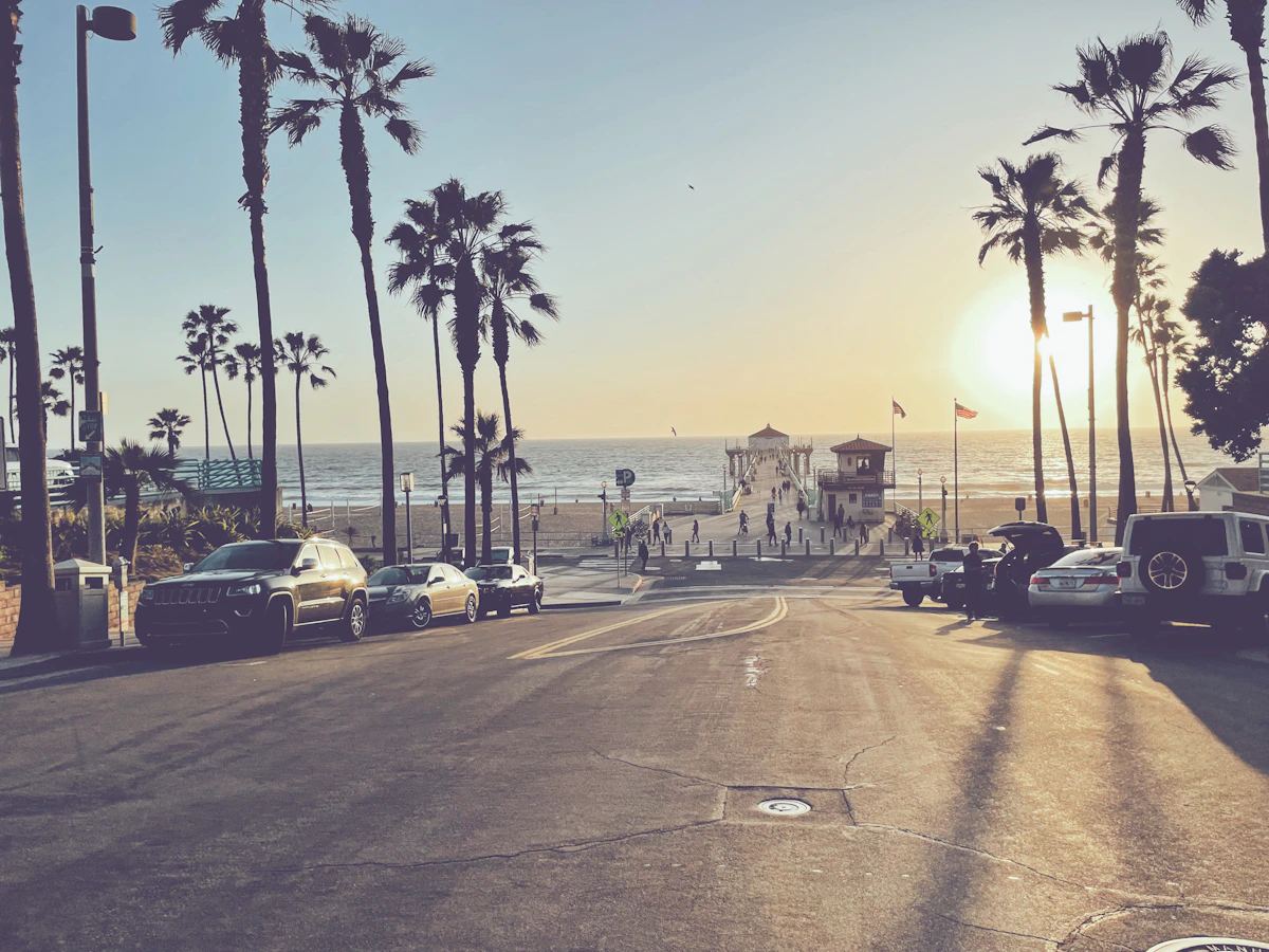 Palm-lined coastal street near downtown Manhattan Beach