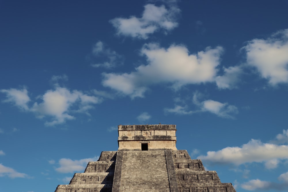a very tall pyramid with a sky background