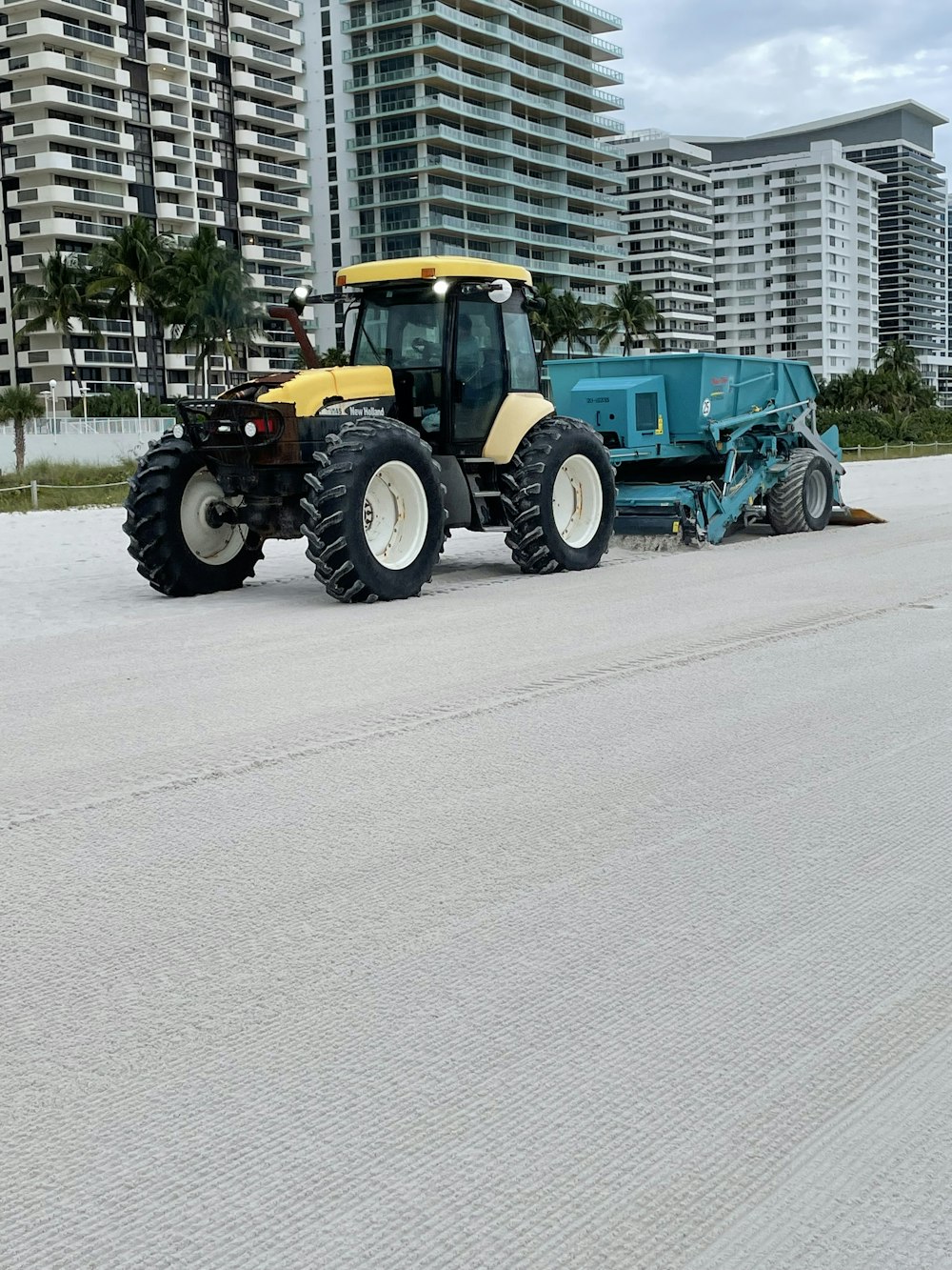 a tractor is parked in front of a building