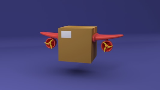 A cardboard box is designed to resemble an airplane, featuring red wings and propellers on either side. The background is a deep blue shade, contrasting with the brown box and red elements.