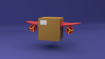 A cardboard box is designed to resemble an airplane, featuring red wings and propellers on either side. The background is a deep blue shade, contrasting with the brown box and red elements.