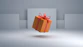 an orange gift box with a red bow