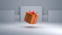 an orange gift box with a red bow
