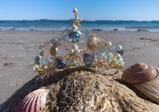 An elegant handcrafted hair comb adorned with real seashells.
