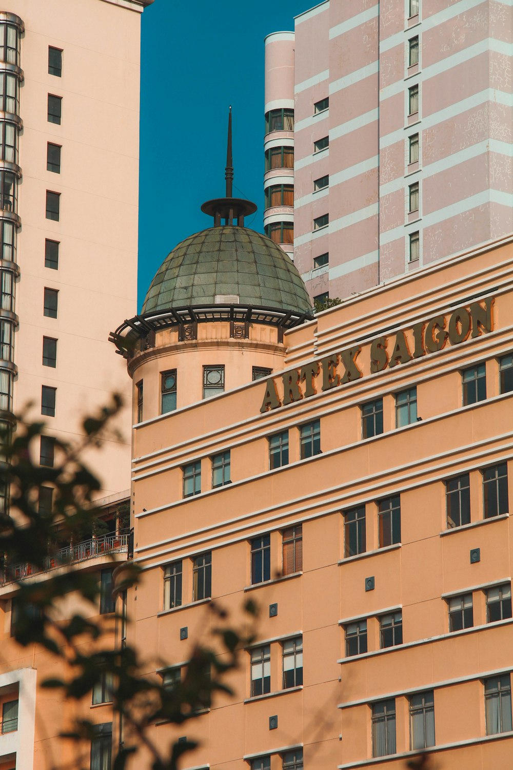 a tall building with a dome on top of it