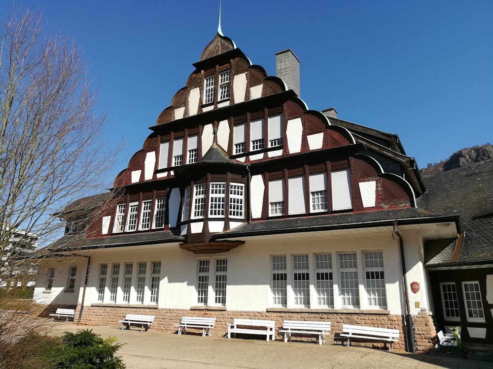 a large building with a tall tower with lots of windows