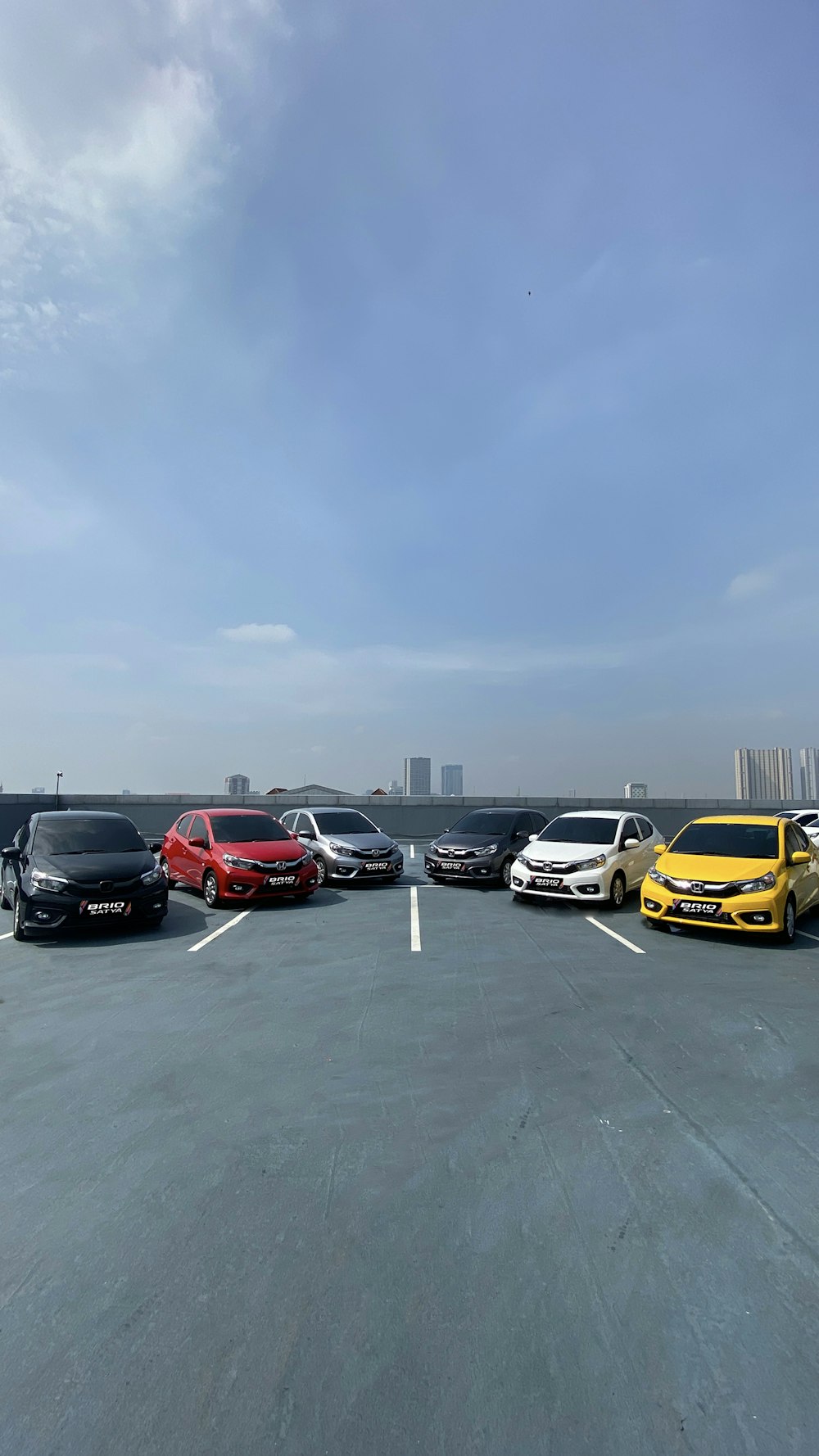 a group of cars parked in a parking lot