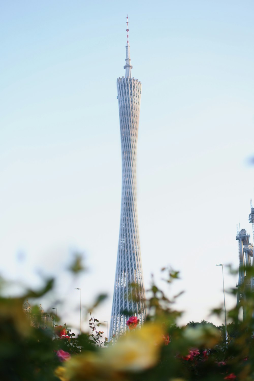 a very tall building with a very tall tower in the background