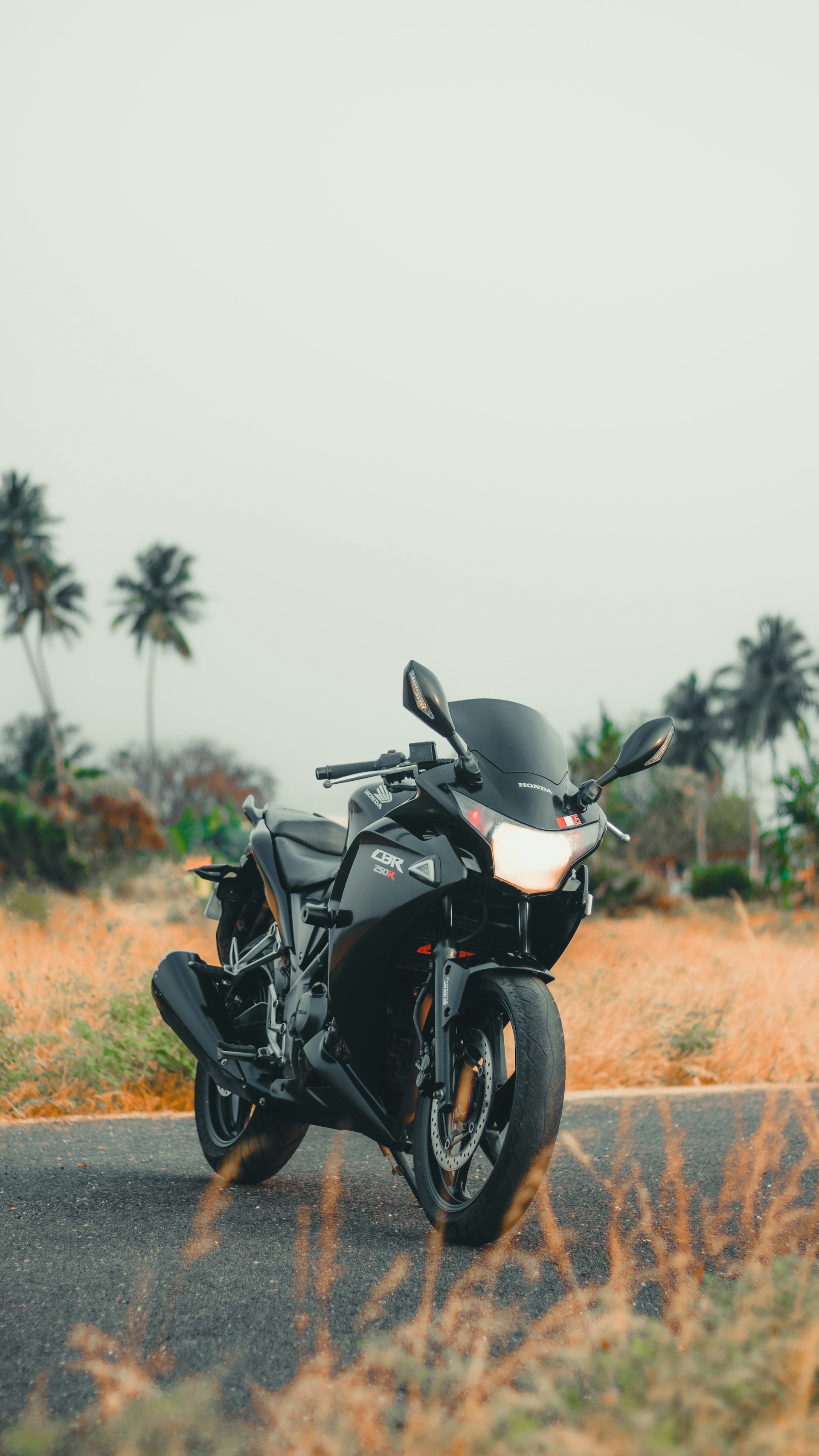 a motorcycle parked on the side of the road