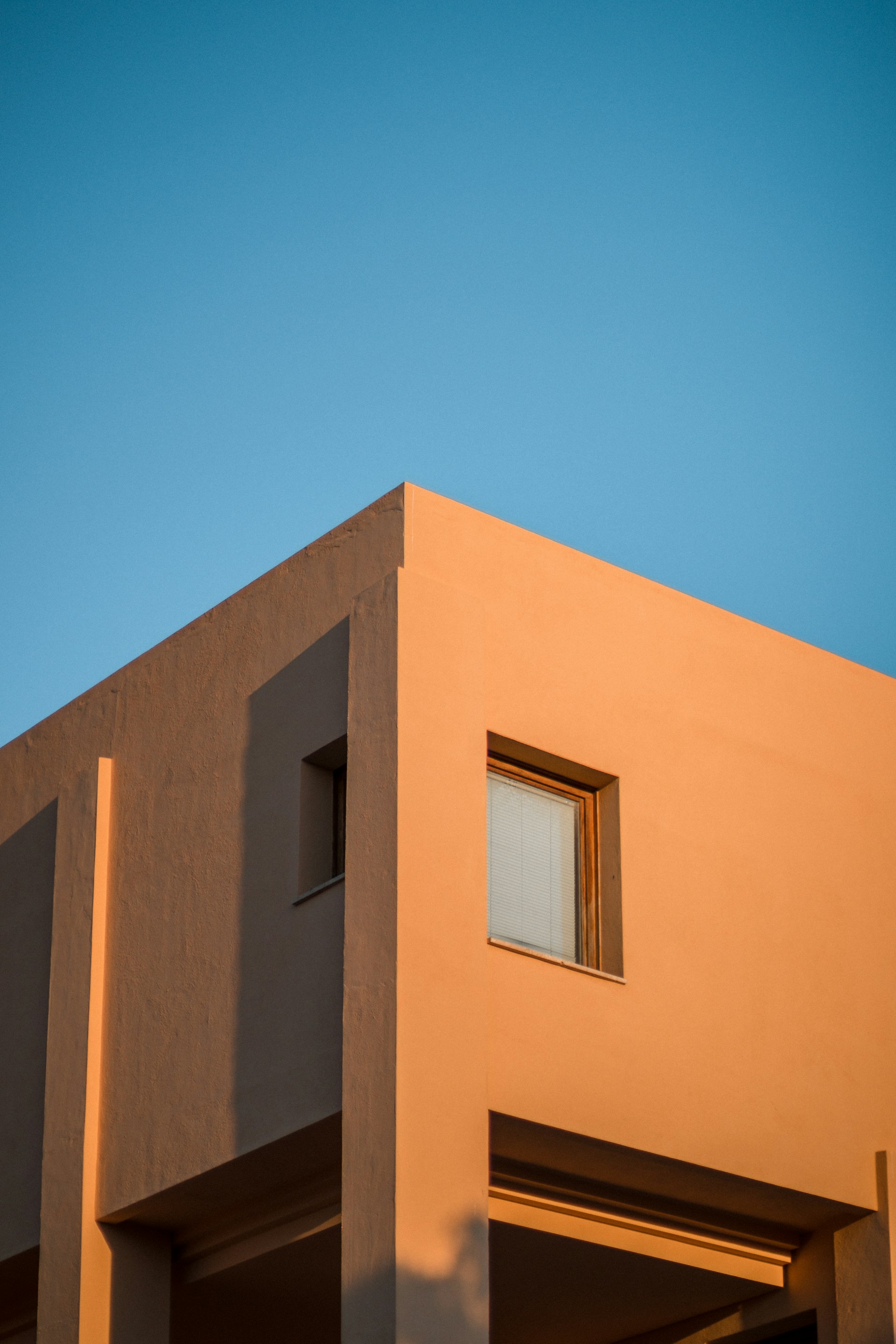 a building with a clock on the front of it