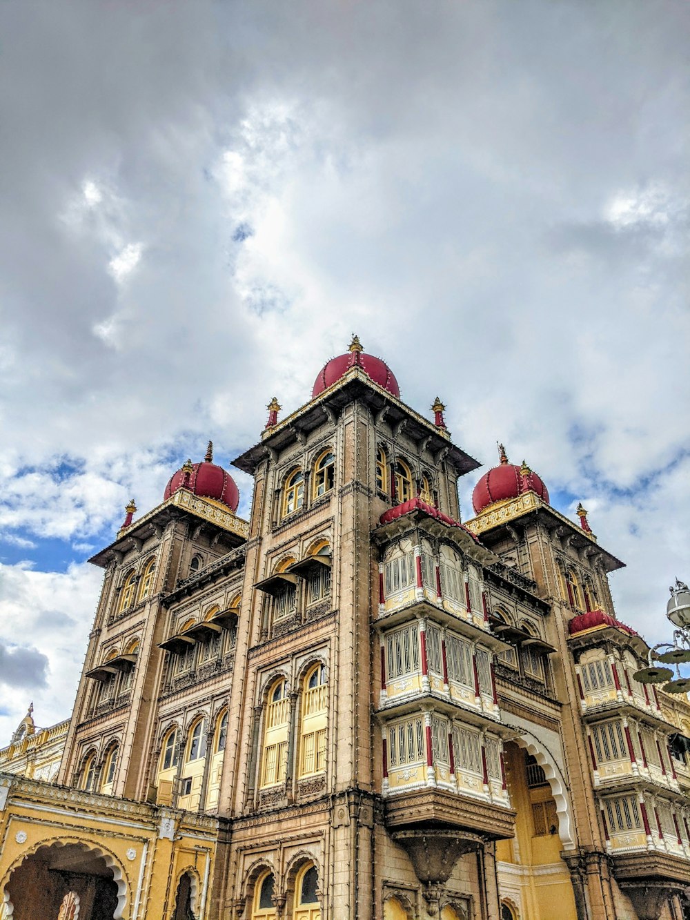 a large building with a red dome on top of it