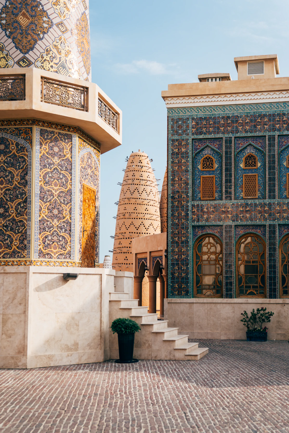 Blue-tiled architecture and traditional forms at Katara Cultural Village in Doha
