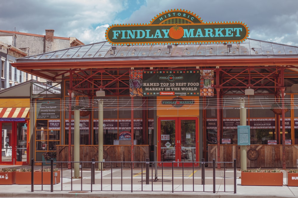 the front of a restaurant with a sign that says findlay market