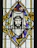 A serene image of a stained glass window depicting the Virgin Mary with soft sunlight streaming through.