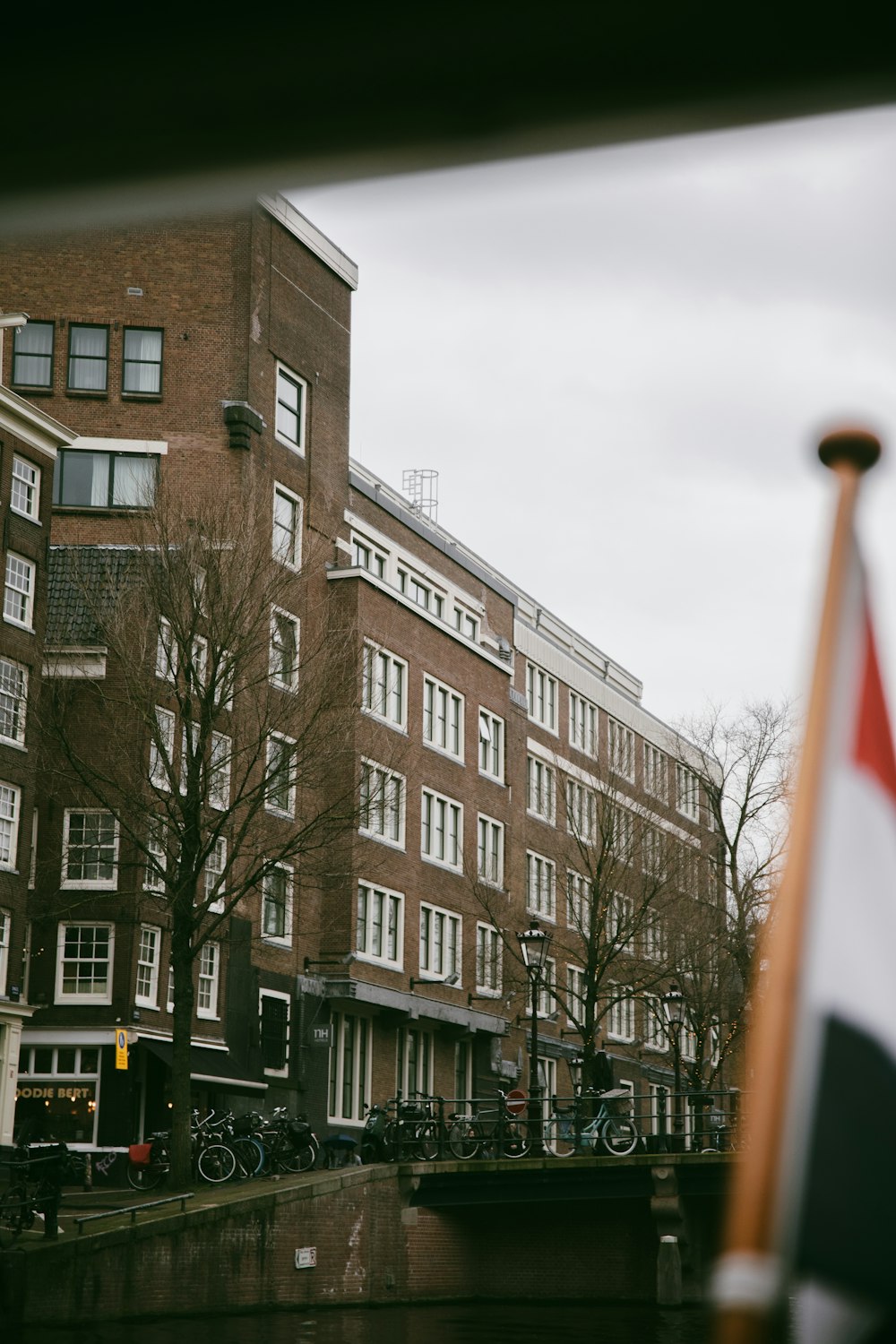 a flag is in front of some buildings