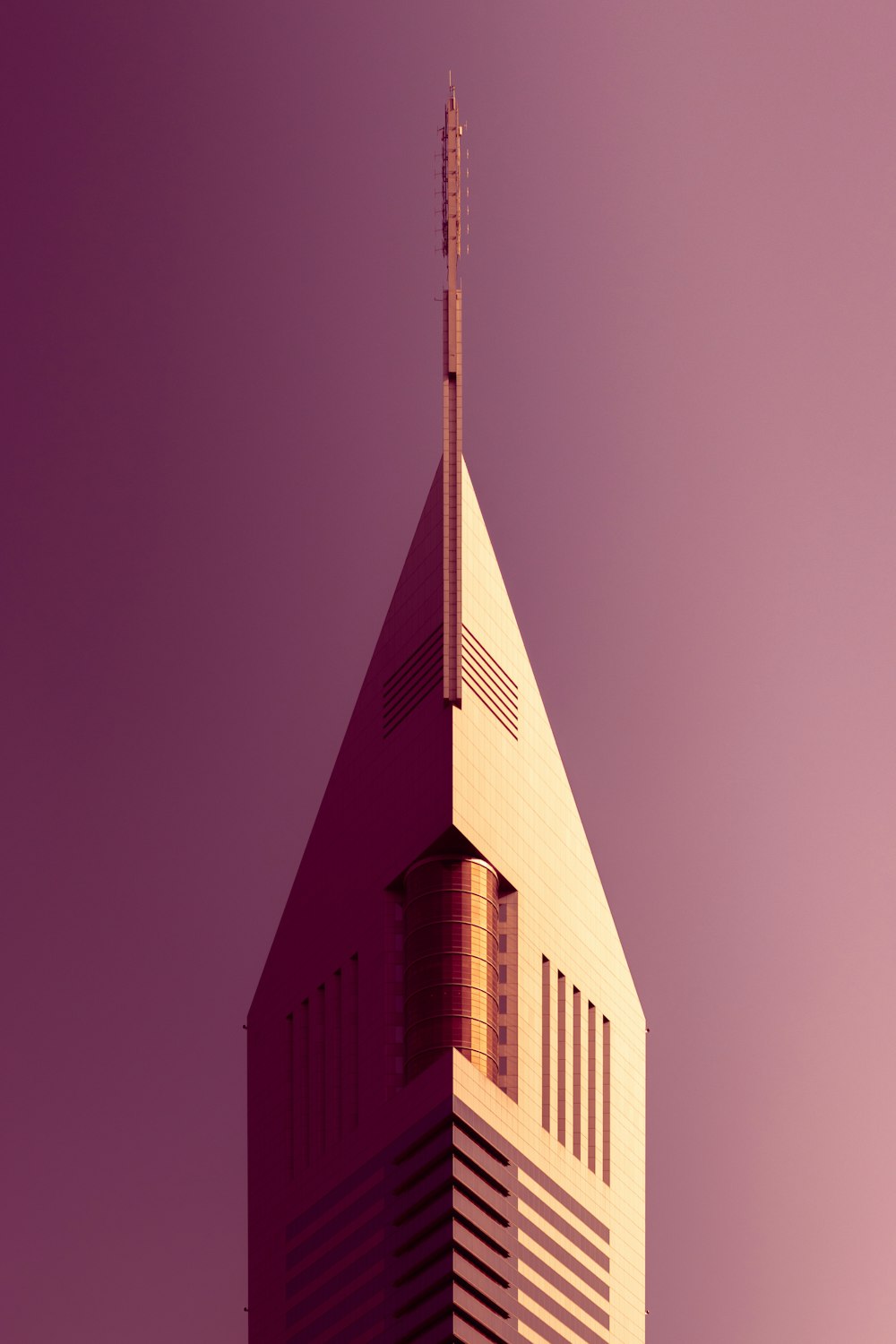 a very tall building with a very tall spire