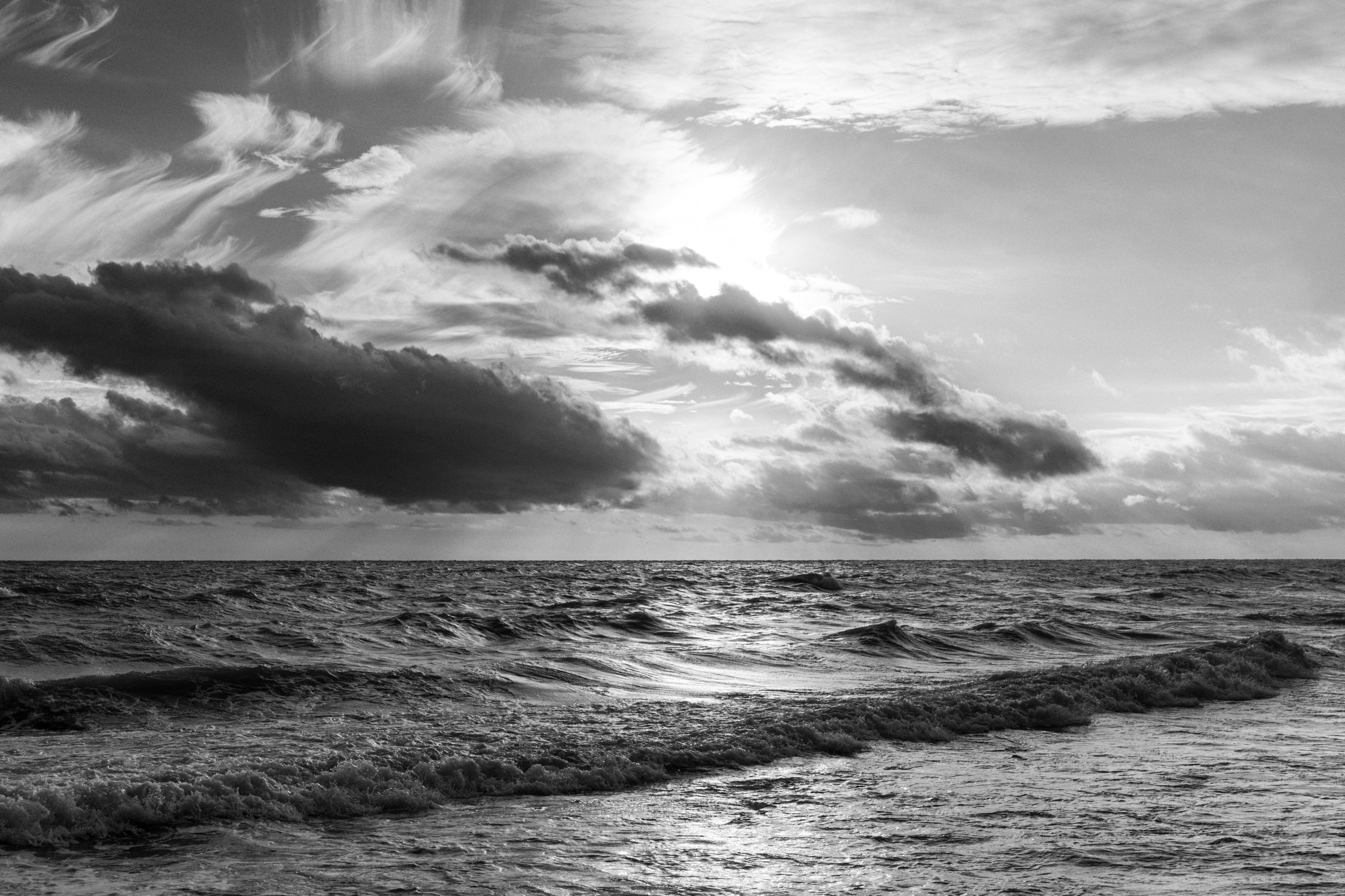 a black and white photo of the ocean