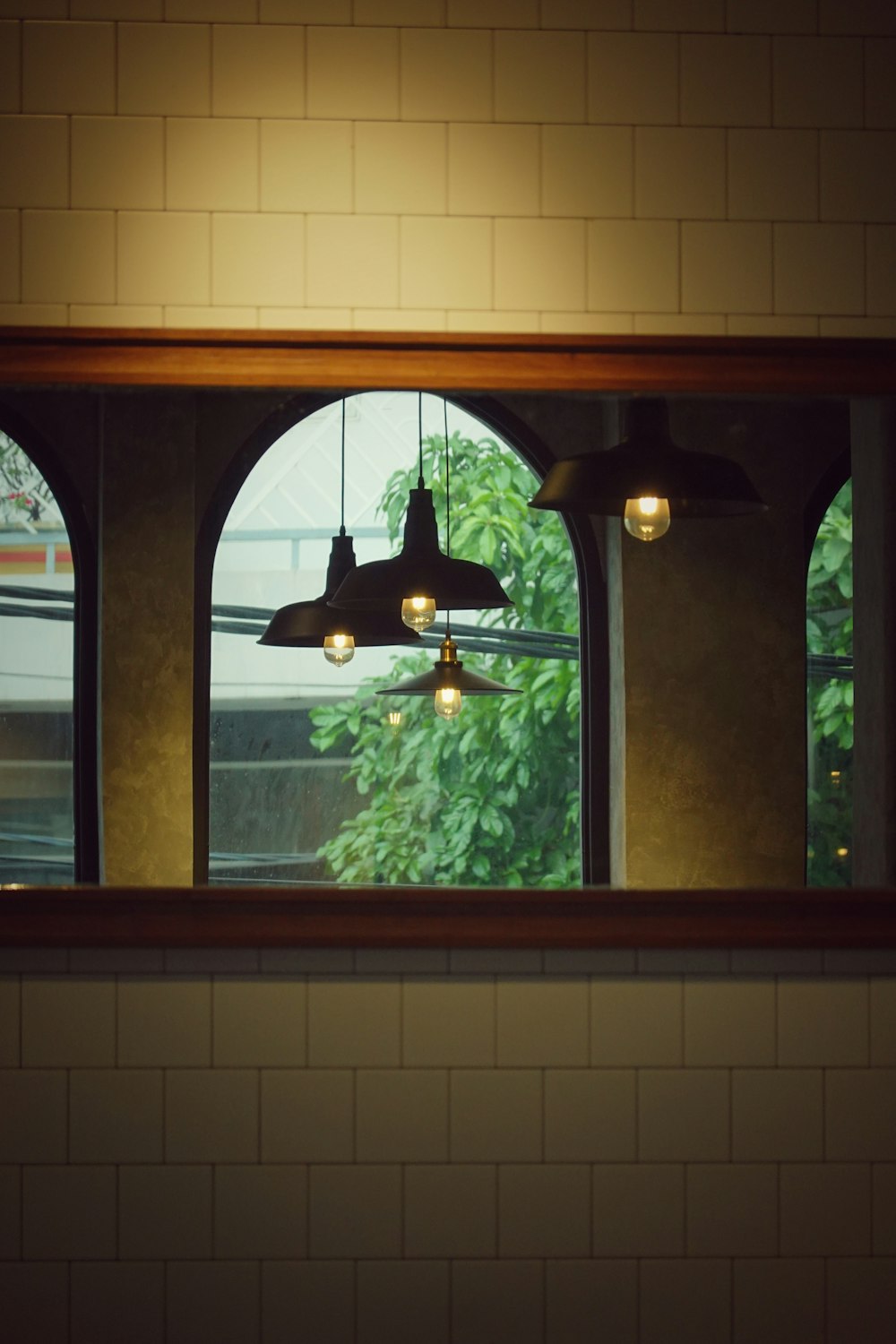 a view of a ceiling fan through a window