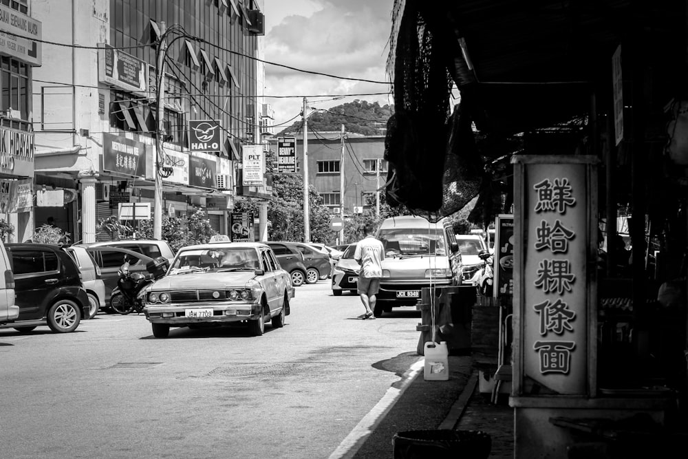 a black and white photo of a city street