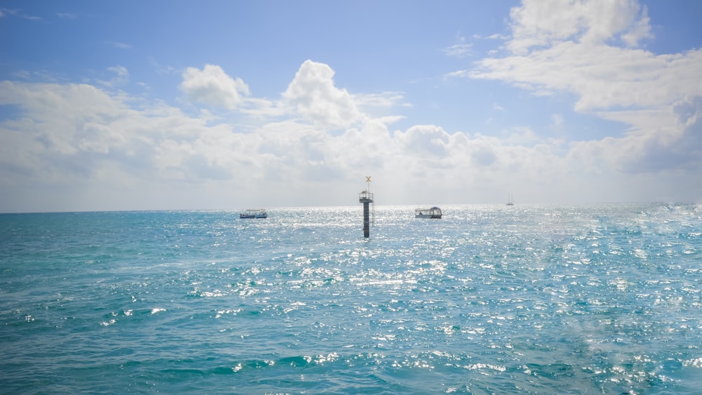 a body of water with boats in the distance