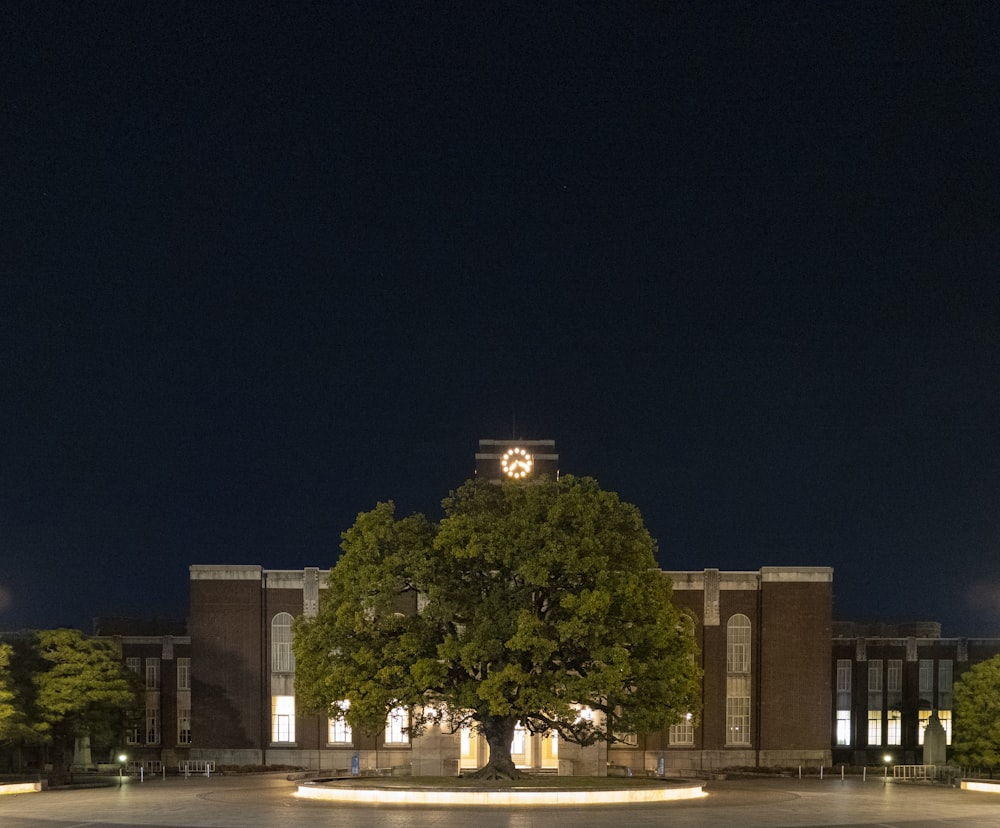 a large building with a clock on the top of it