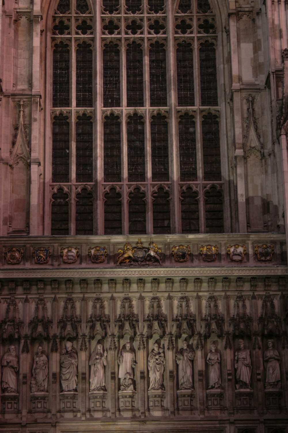 a large cathedral with a clock on the front of it