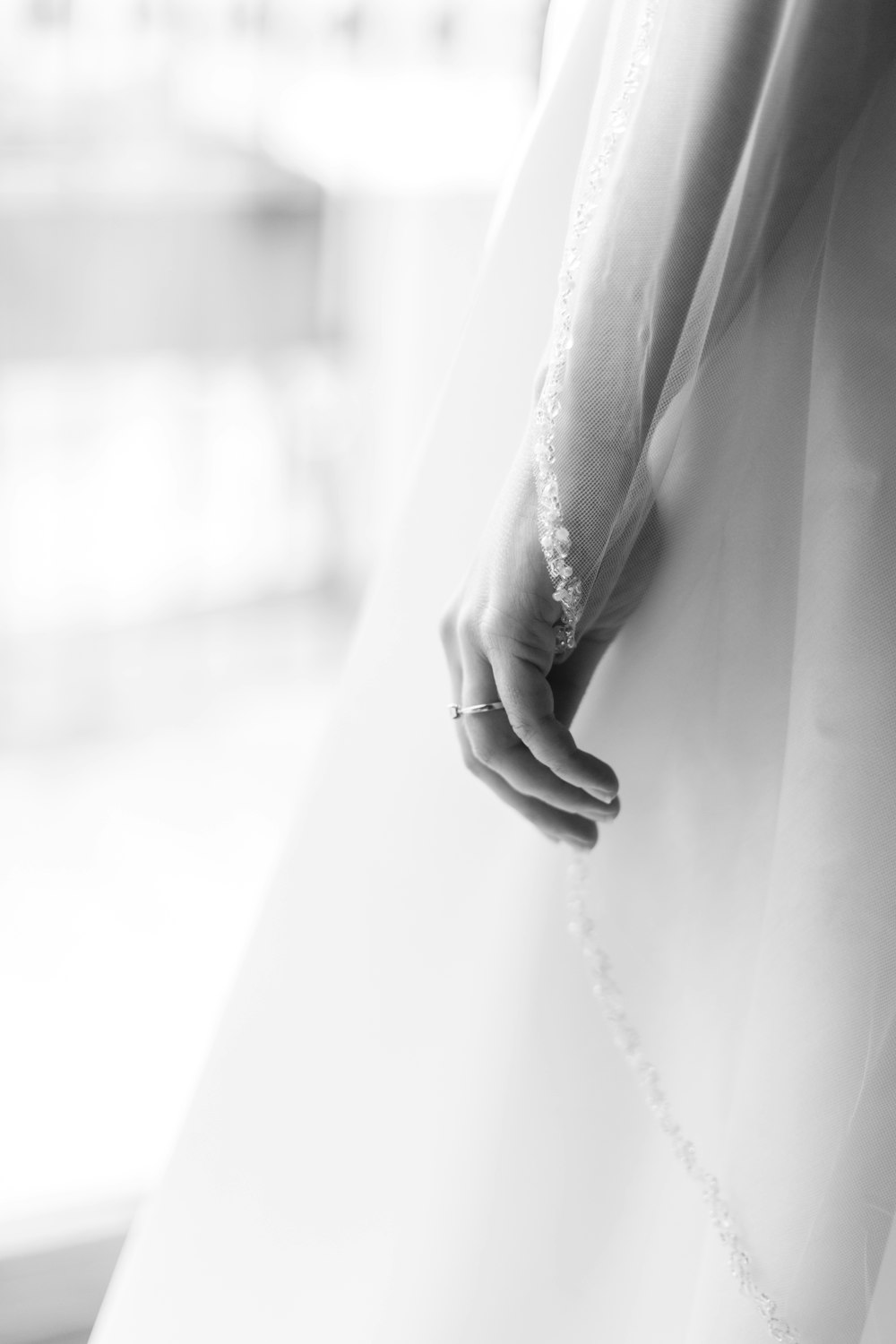 a close up of a person wearing a wedding dress